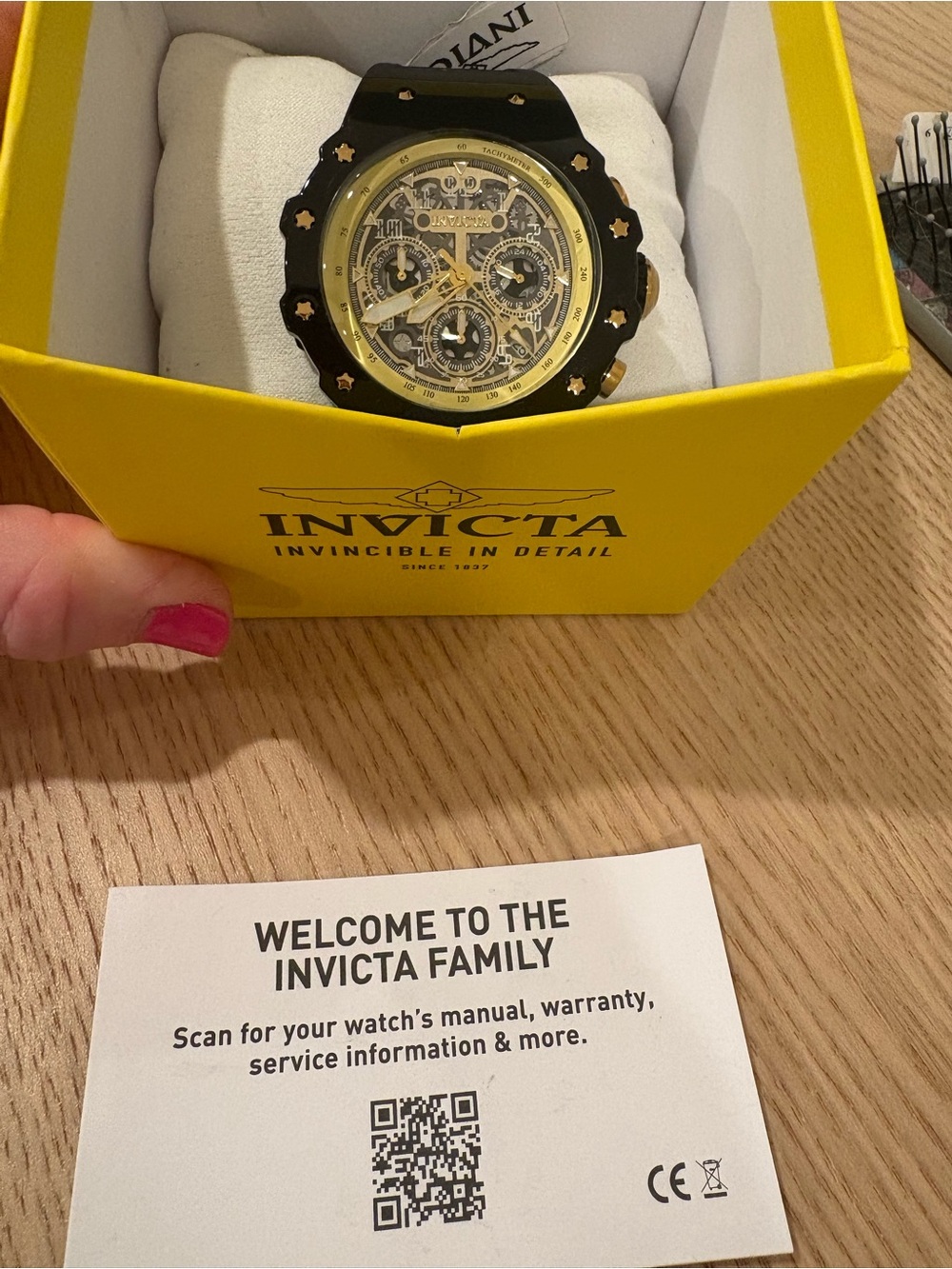 Invicta Black and Gold Dial Chronograph Watch